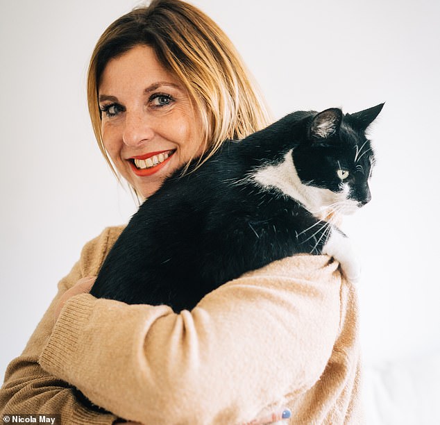 Nicola May, author, and her cat Stan. 